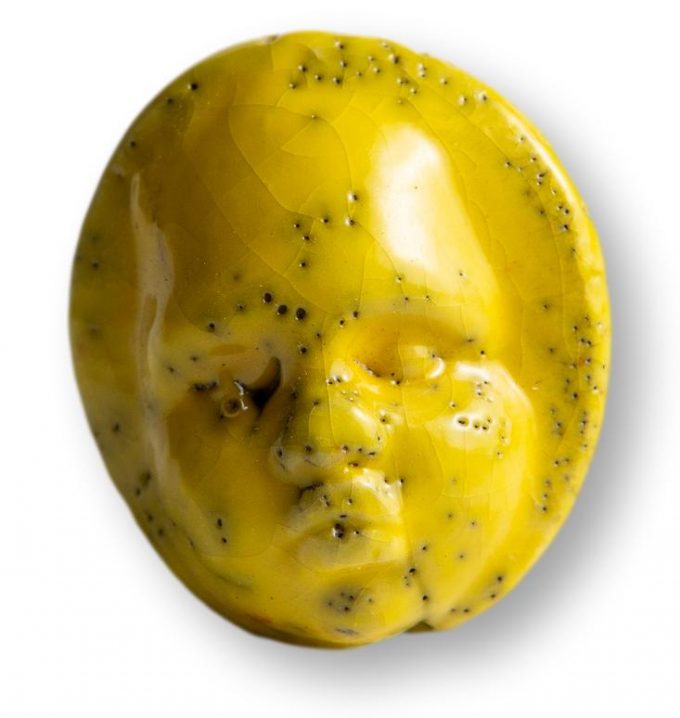 kapinupp kollane nägu
