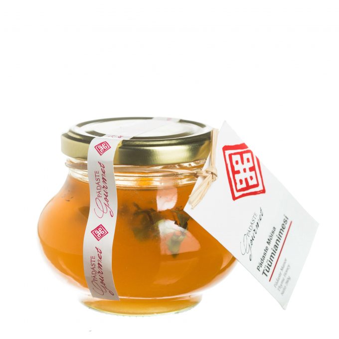 thyme honey in glass jar